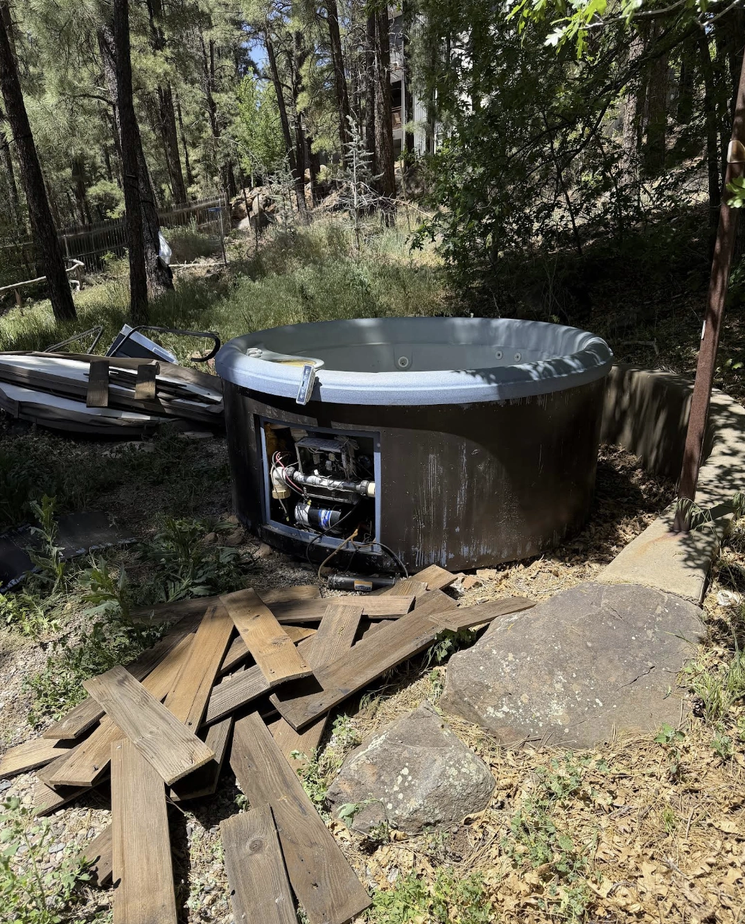 hot tub removal wooded property